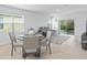 Cozy living room area with tile flooring and sliding doors that lead to the backyard at 993 King Parc Rd, Orange City, FL 32763