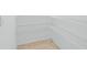 Walk-in pantry with white wire shelving and neutral tile flooring at 993 King Parc Rd, Orange City, FL 32763