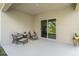 Comfortable patio seating and a sliding glass door enhance indoor-outdoor living at 993 King Parc Rd, Orange City, FL 32763