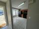 Bright eat-in kitchen featuring black appliances and tiled flooring at 1103 Jade East Ln # 1103, Kissimmee, FL 34744