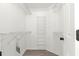 Walk-in closet with ample shelving for organized storage at 11643 Sw 137Th Loop, Dunnellon, FL 34432