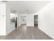 Spacious living area with open flow to kitchen featuring stainless steel appliances at 11643 Sw 137Th Loop, Dunnellon, FL 34432
