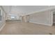 An open-concept living room with a kitchen and dining area at 1251 Cresswind Blvd, Deland, FL 32724