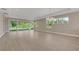 Bright open living room featuring hardwood floors and views of the backyard at 1251 Cresswind Blvd, Deland, FL 32724