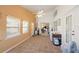 Spacious sunroom featuring tile floors, many windows for ample light, and easy access to the outdoors at 136 Majestic Forest Run, Sanford, FL 32771