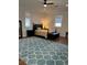 Bedroom with a ceiling fan, large windows, and wood-look floors at 1611 Chestnut Ave, Winter Park, FL 32789