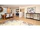 Dining room with a modern decor, wood table, and chairs, excellent for hosting gatherings at 1611 Chestnut Ave, Winter Park, FL 32789