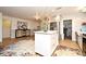 Spacious kitchen with island that opens into a living space at 1611 Chestnut Ave, Winter Park, FL 32789