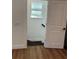 A view of the staircase, with a glimpse of the upstairs hall at 1611 Chestnut Ave, Winter Park, FL 32789