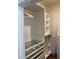 Spacious walk-in closet with custom organizers, drawers, shelves, and hanging rods at 1611 Chestnut Ave, Winter Park, FL 32789