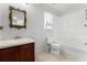 Bathroom featuring a vanity and a tub-shower combo with tile surround at 1826 Delafield Dr, Winter Garden, FL 34787