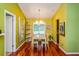 Dining room featuring hardwood floors and a chandelier at 22 Sweetwater Creek Cir, Oviedo, FL 32765