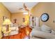 Inviting living room with vaulted ceilings, hardwood floors, and comfortable seating at 22 Sweetwater Creek Cir, Oviedo, FL 32765