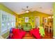 Bright living room with hardwood floors, modern furnishings, and abundant natural light at 22 Sweetwater Creek Cir, Oviedo, FL 32765