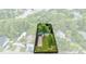 Charming single-story home with a long drive and lush green surroundings at 2208 Page Ave, Orlando, FL 32806