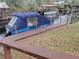 Dock with covered boat and lake in background at 2215 Hontoon Rd., Deland, FL 32720