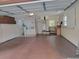 Spacious garage with laundry area, work bench, cabinets, and natural light from a window at 2215 Hontoon Rd., Deland, FL 32720