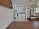 Functional laundry area with white washer and dryer, water heater, and utility sink at 2215 Hontoon Rd., Deland, FL 32720