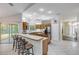 Large kitchen featuring a breakfast bar, stainless steel appliances, and ample storage at 27 Foxhunter Flt, Ormond Beach, FL 32174