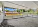 Enclosed patio with a concrete floor and screened walls offers versatile space at 2814 Bonneville Dr, Orlando, FL 32826