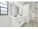 Modern bathroom featuring a double vanity and updated fixtures at 305 Haverlake Cir, Apopka, FL 32712