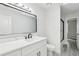Modern bathroom featuring black hardware, a new vanity and walk-in shower at 305 Haverlake Cir, Apopka, FL 32712