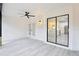 Open covered patio with views to the kitchen and backyard at 305 Haverlake Cir, Apopka, FL 32712