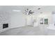 Spacious living area with fireplace, skylight, adjoins kitchen and dining area at 305 Haverlake Cir, Apopka, FL 32712