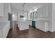 Gorgeous kitchen featuring bright white cabinetry, a center island with a white countertop, and stainless steel appliances at 3450 Whitner Way, Sanford, FL 32773