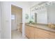 Bathroom featuring double vanity with granite counters at 398 Pine Tree Rd, Lake Mary, FL 32746