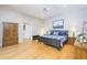 Bedroom with natural lighting, ceiling fan and wood floors at 398 Pine Tree Rd, Lake Mary, FL 32746