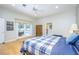 Bedroom with French doors, wood floors, and ceiling fan at 398 Pine Tree Rd, Lake Mary, FL 32746
