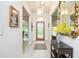 Inviting foyer with decorative glass door and stylish décor at 398 Pine Tree Rd, Lake Mary, FL 32746