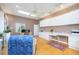 Bright living room with hardwood floors, skylights, built-in cabinets and comfortable seating at 398 Pine Tree Rd, Lake Mary, FL 32746