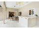 Covered patio featuring outdoor dining and bar area, seamlessly connecting to the home's interior at 398 Pine Tree Rd, Lake Mary, FL 32746