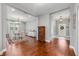 Elegant dining room with hardwood floors, chandelier, and decorative furnishings at 4160 Golden Willow Cir, Apopka, FL 32712