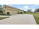 A large, two-car garage is attached to this well-maintained home with a spacious driveway at 4160 Golden Willow Cir, Apopka, FL 32712