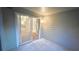 A patio or covered porch with a sliding glass door leads to the living room of a condo for sale at 5016 Park Central Dr # 2231, Orlando, FL 32839