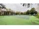 Well-maintained tennis courts surrounded by mature trees, offering residents a great recreational amenity at 5016 Park Central Dr # 2231, Orlando, FL 32839