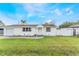 Charming single-story home with a well-manicured lawn and inviting entrance, offering classic curb appeal at 5380 Barton Dr, Orlando, FL 32807