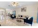 Bright living room with tile flooring, modern furniture and open concept layout at 5509 Florence Harbor Dr, Orlando, FL 32829