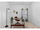 Office with tiled floor features a modern desk with a comfortable chair and natural light from a window at 5509 Florence Harbor Dr, Orlando, FL 32829