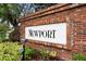 Community entrance sign with brickwork and well-maintained landscaping at 5509 Florence Harbor Dr, Orlando, FL 32829