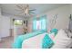 Bedroom featuring gray accents and a large window that offers natural light at 5637 Cedar Chase Dr, St Cloud, FL 34771