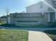 Entrance to Split Oak Reserve community with sign and green landscaping at 5637 Cedar Chase Dr, St Cloud, FL 34771