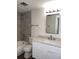 Bathroom showcasing a tiled shower and a modern vanity with ample counter space at 586 Orange Dr # 114, Altamonte Springs, FL 32701