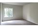 Bedroom with carpeted floor and a window that provides lots of natural light at 586 Orange Dr # 114, Altamonte Springs, FL 32701