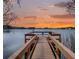 Sunset view from the community dock offering a peaceful and scenic waterfront experience at 586 Orange Dr # 114, Altamonte Springs, FL 32701