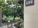 Exterior view with landscaping and view of the green space at 586 Orange Dr # 114, Altamonte Springs, FL 32701