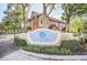 Exterior view of the Azur community sign, featuring a landscaped entrance at 6356 Raleigh St # 1512, Orlando, FL 32835